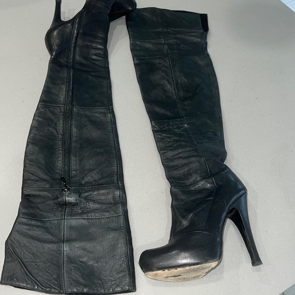 report signature thigh high boots